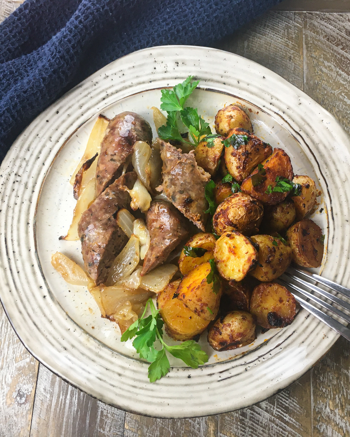 Easy Chorizo and Potatoes Sheet Pan Dinner on a white plate