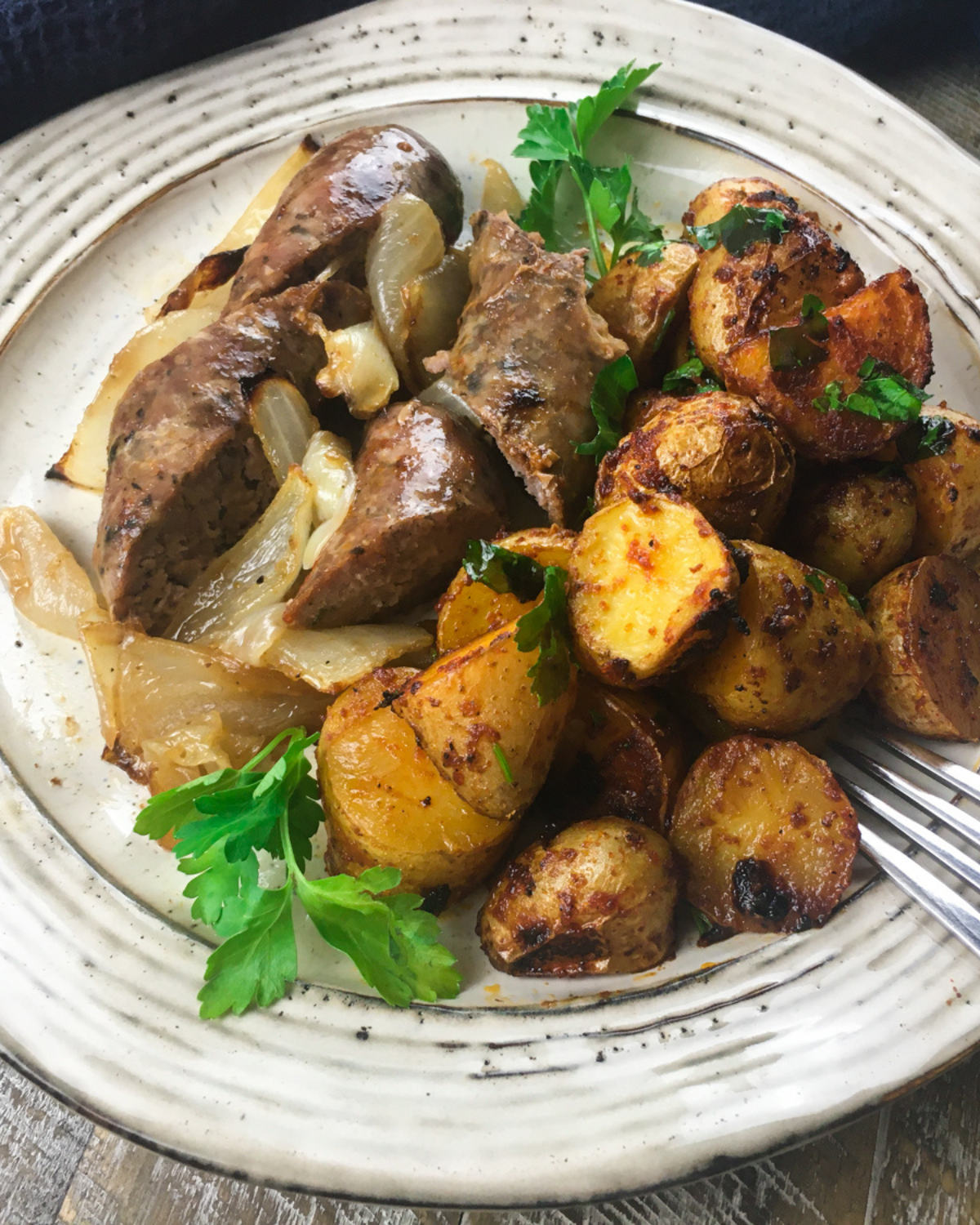 Easy Chorizo and Potatoes Sheet Pan Dinner on a white plate