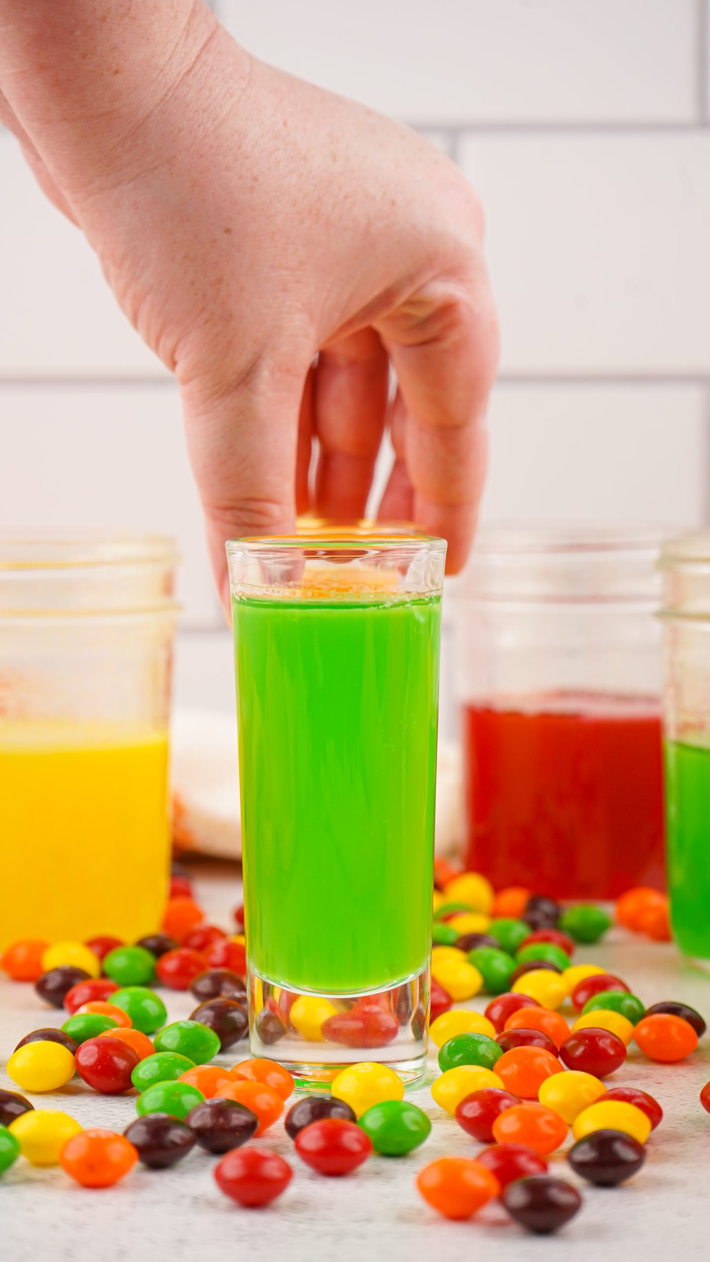 green skittles vodka in a shot glass