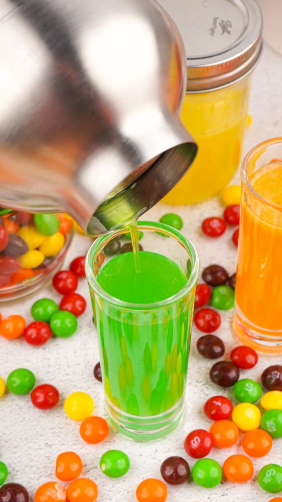 straining green vodka