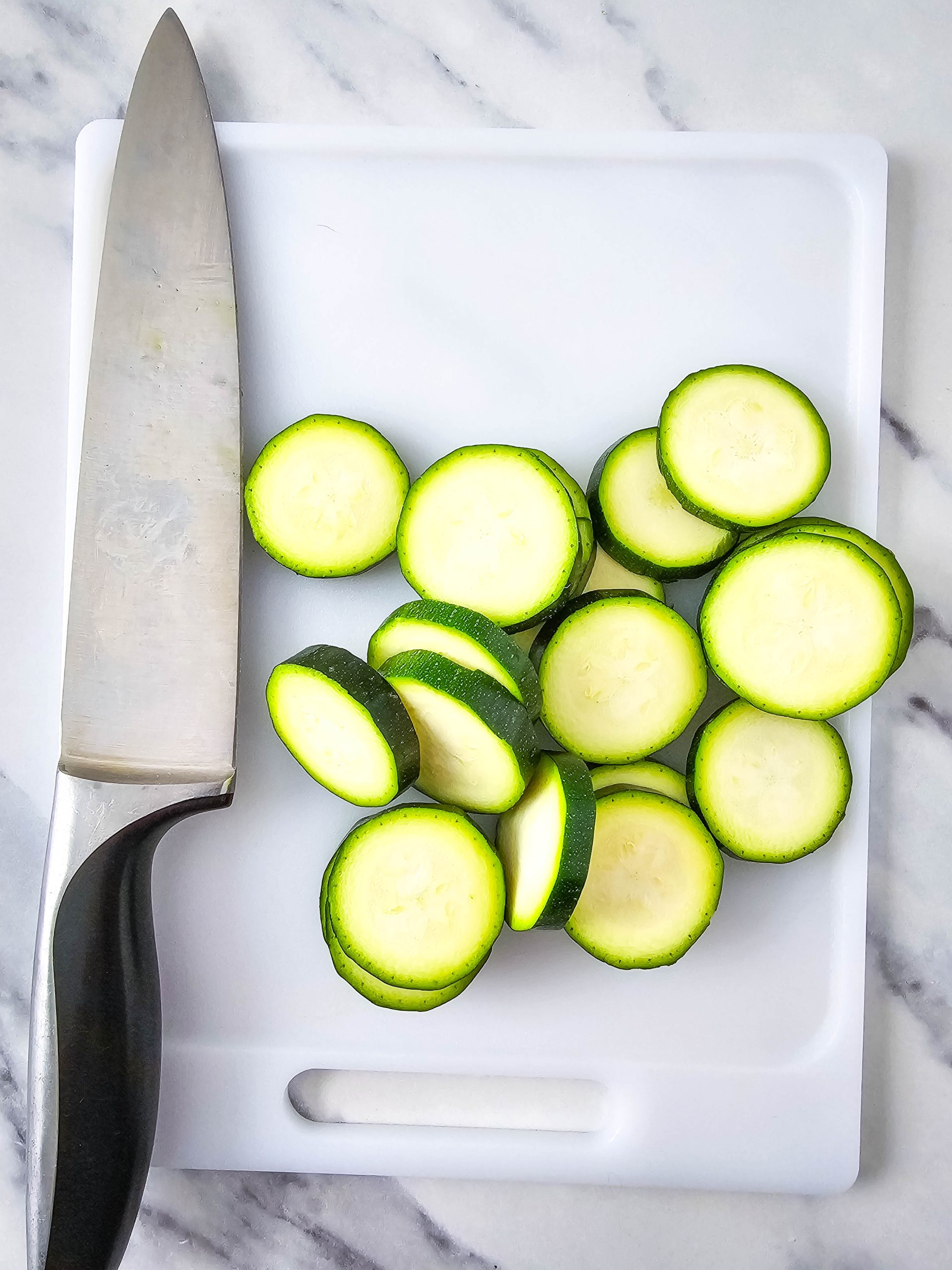 zucchini cut on a cutting board