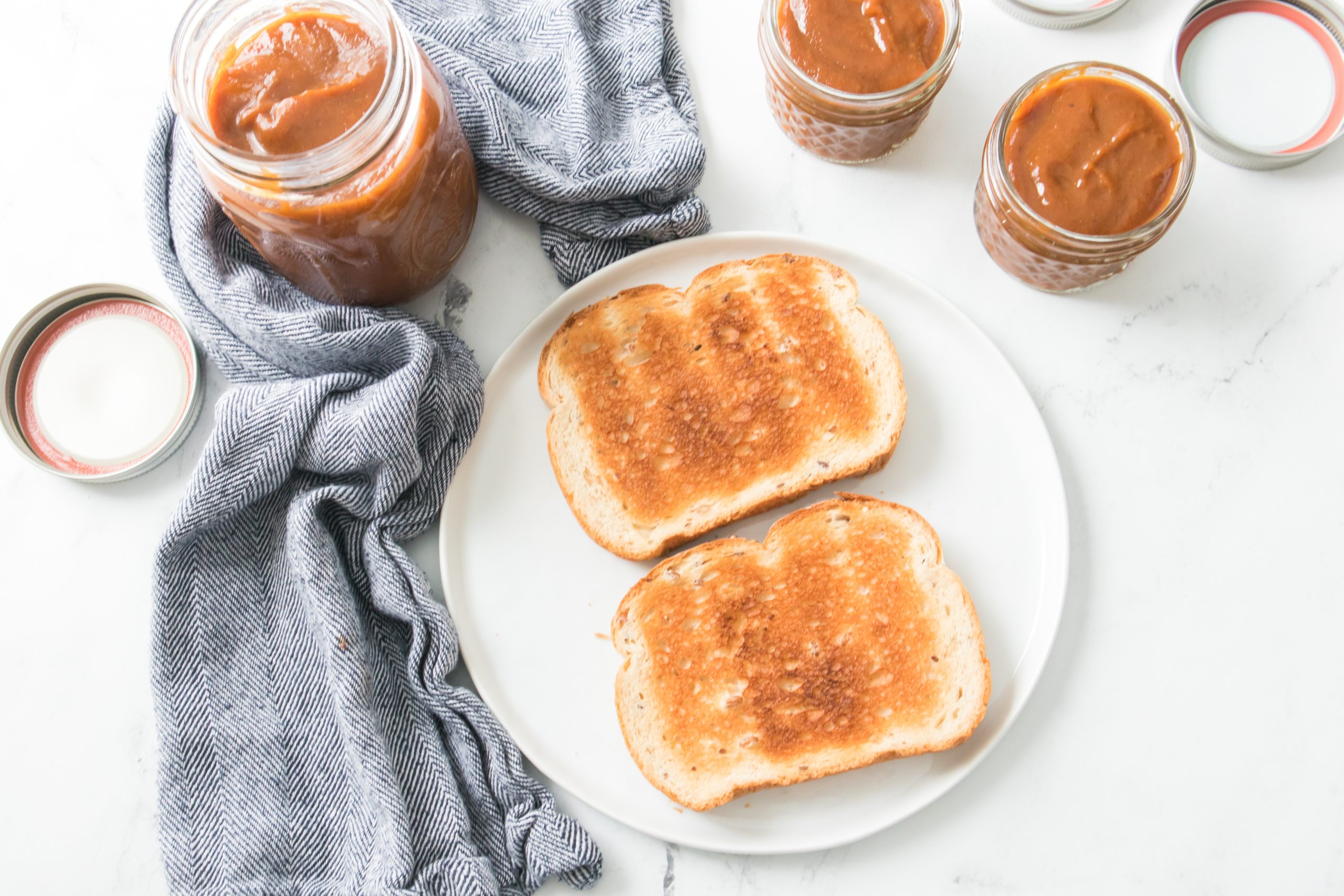 toast with pumpkin butter in jars