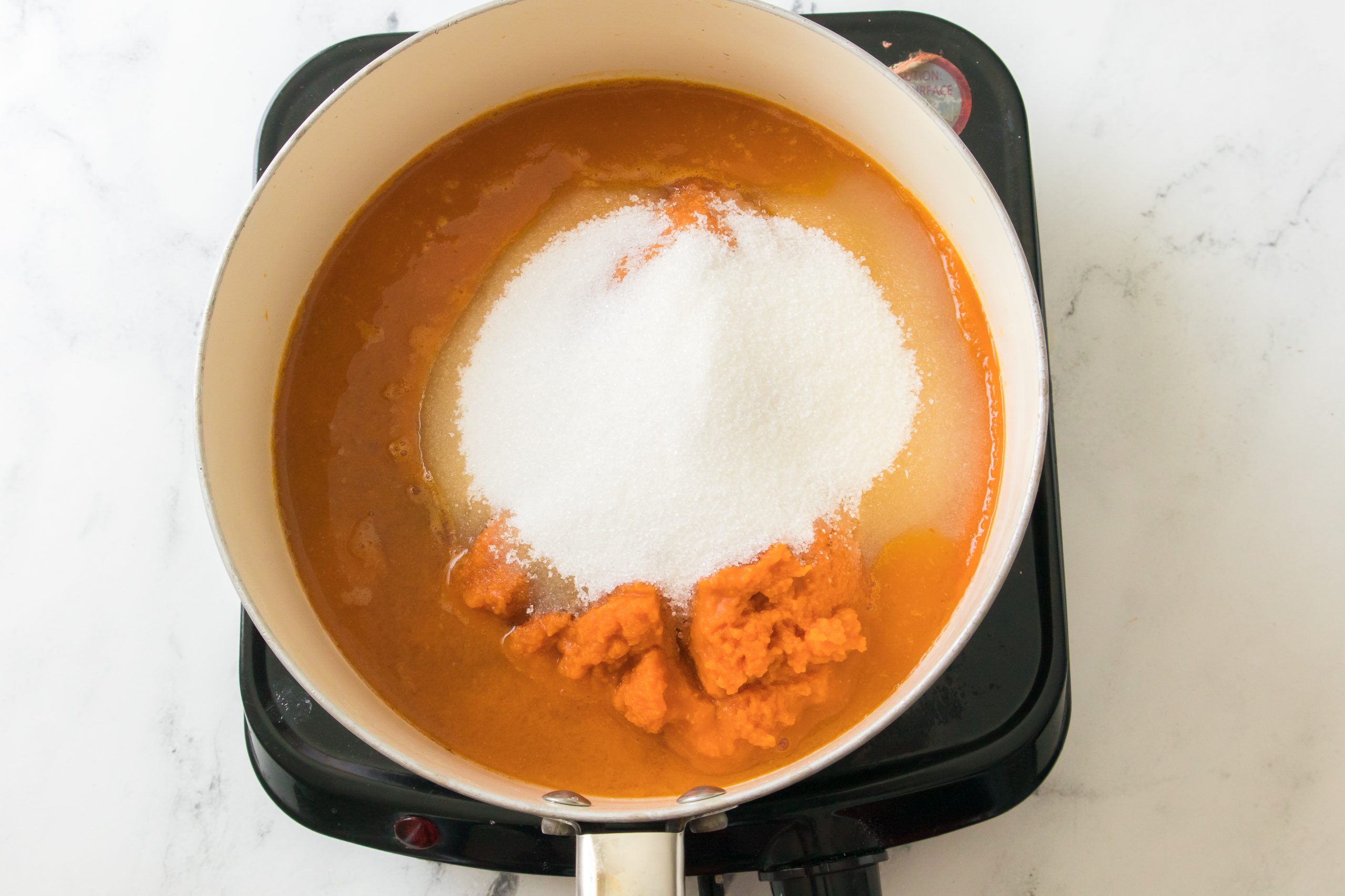 pumpkin butter ingredients in the pan