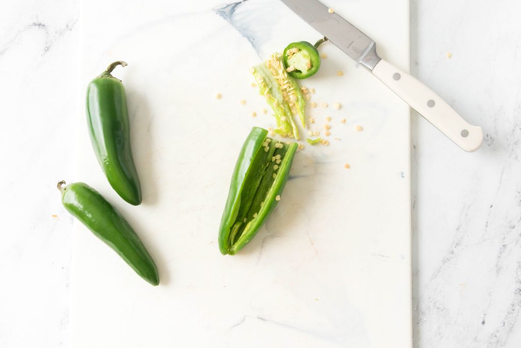 cut jalpenos and scrap seeds