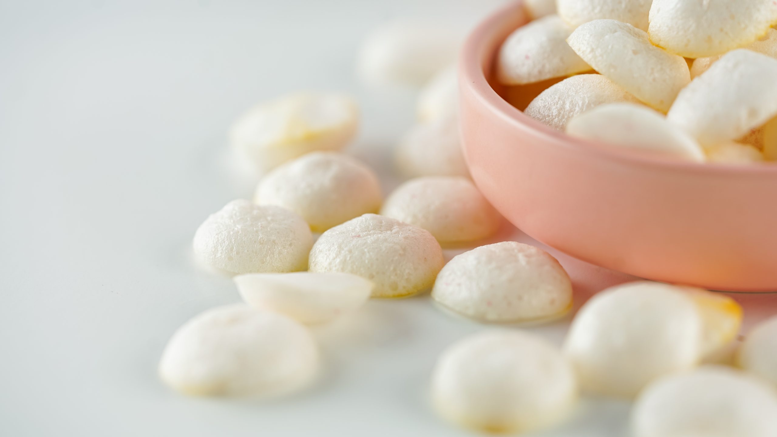 homemade baby yogurt drops next to a bowl