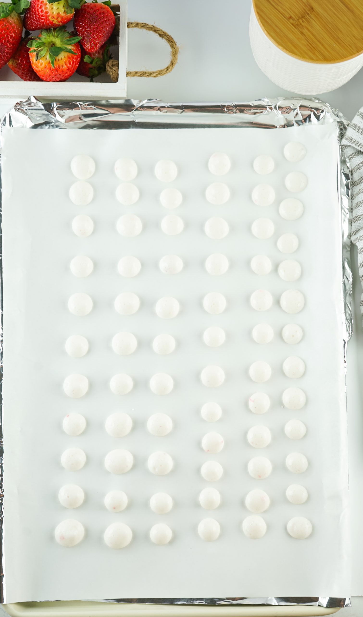 pipe the yogurt drops into the sheet pan