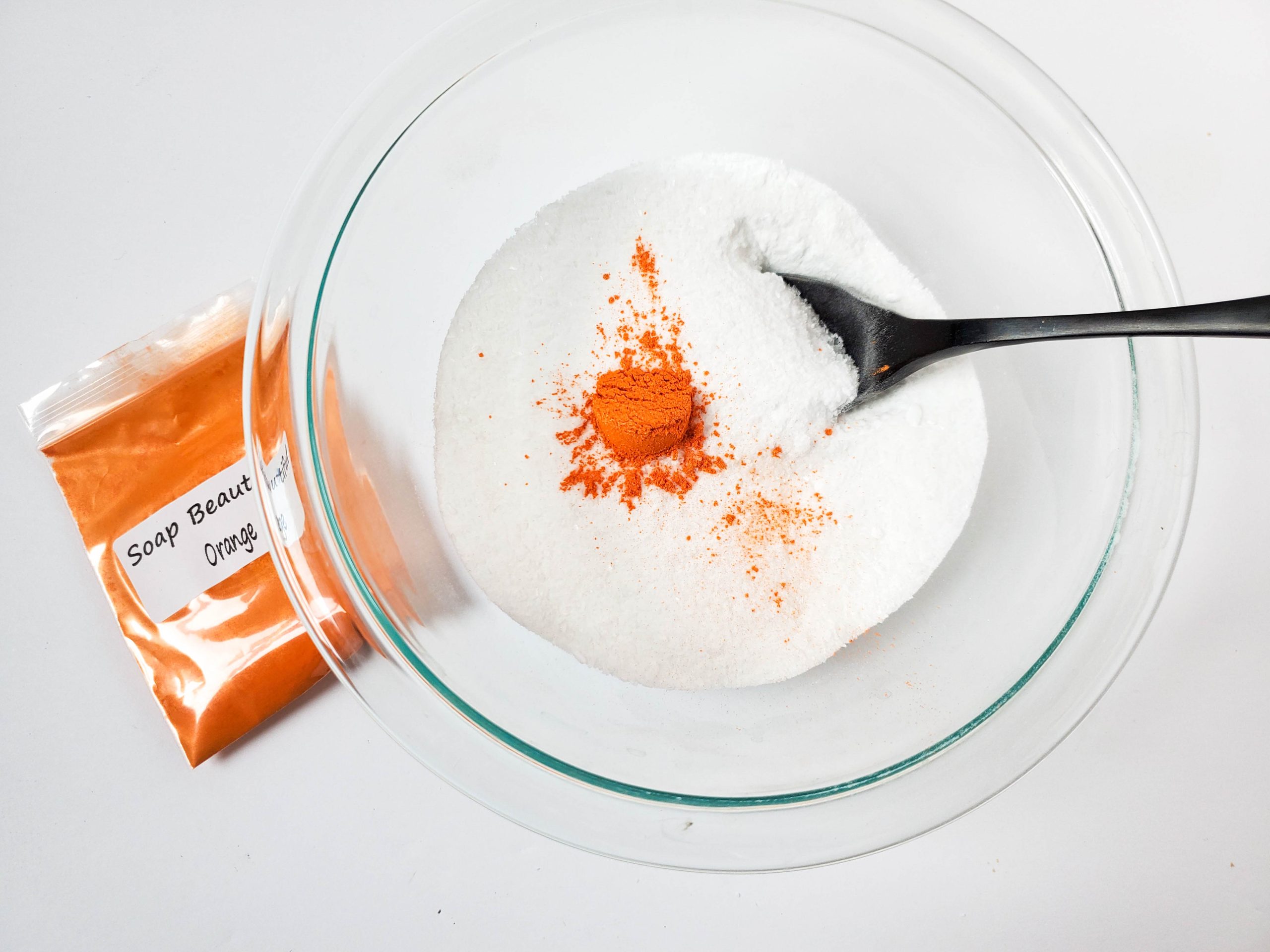 adding color to the sweet orange shower steamer