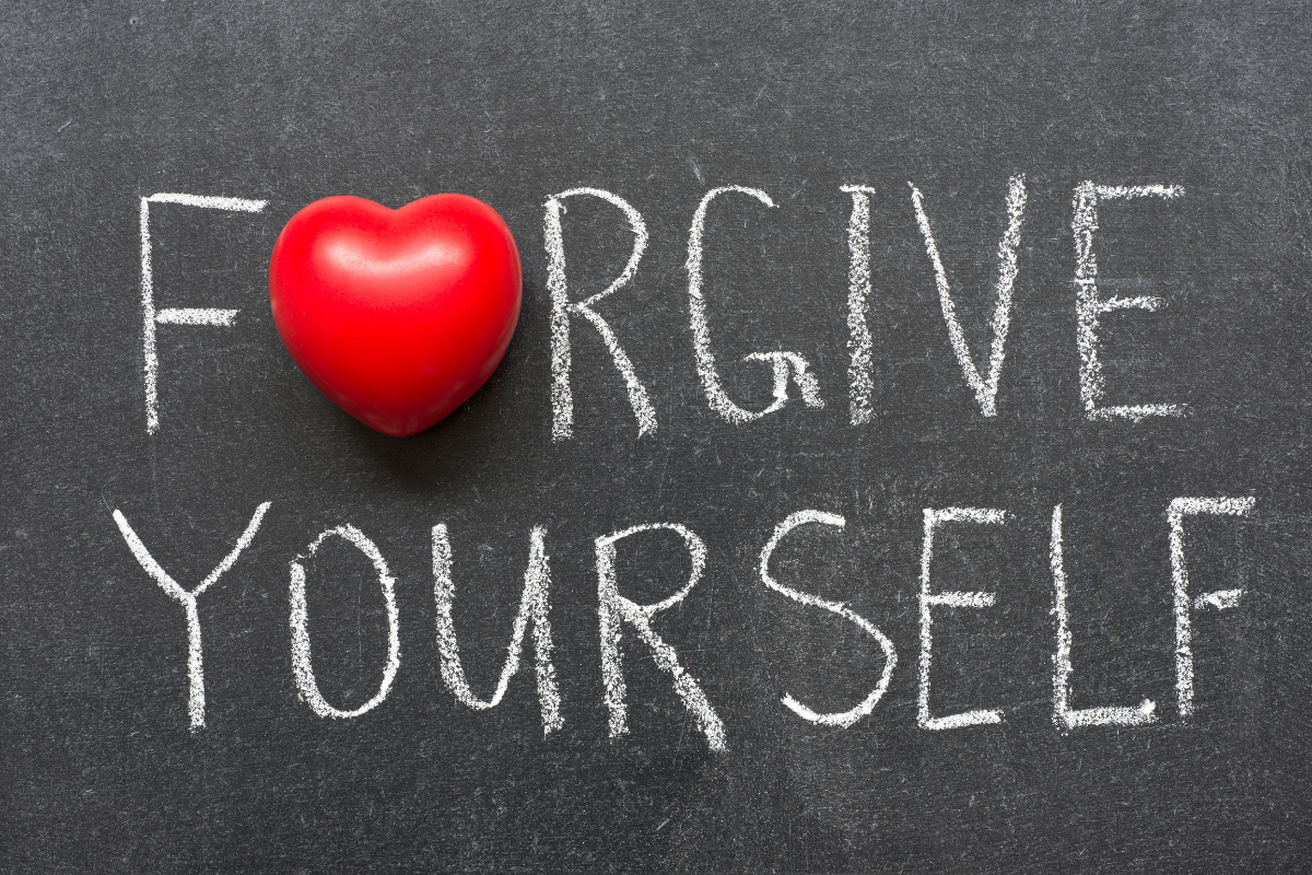 sign saying forgive yourself
