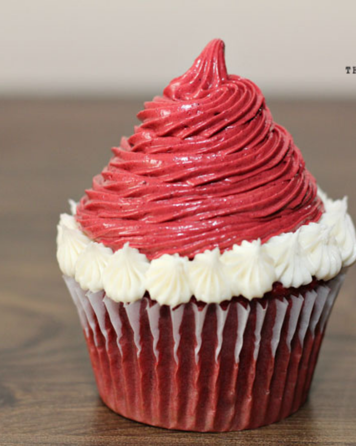 red frosting in the shape of the hat