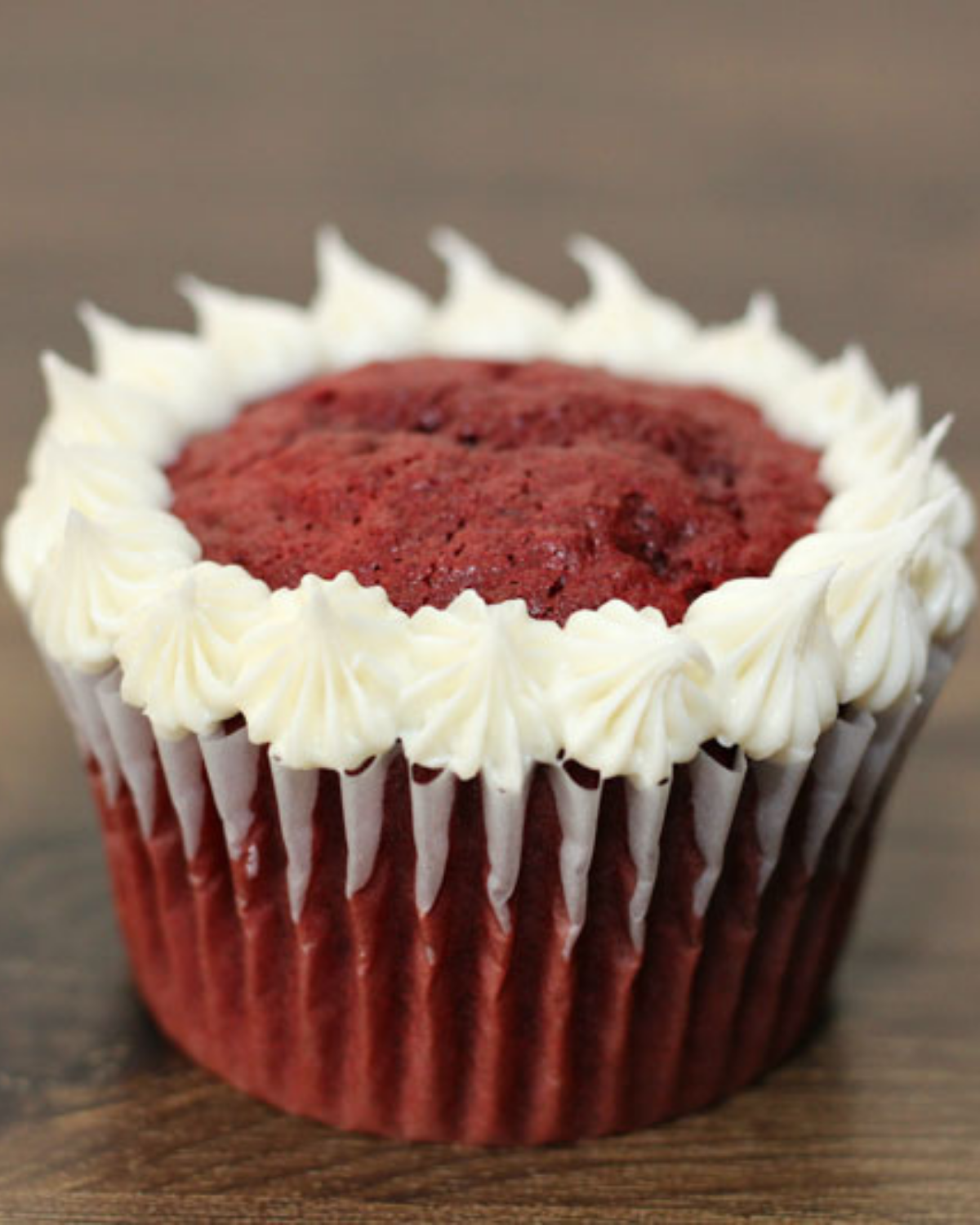 white frosting around the cupcake
