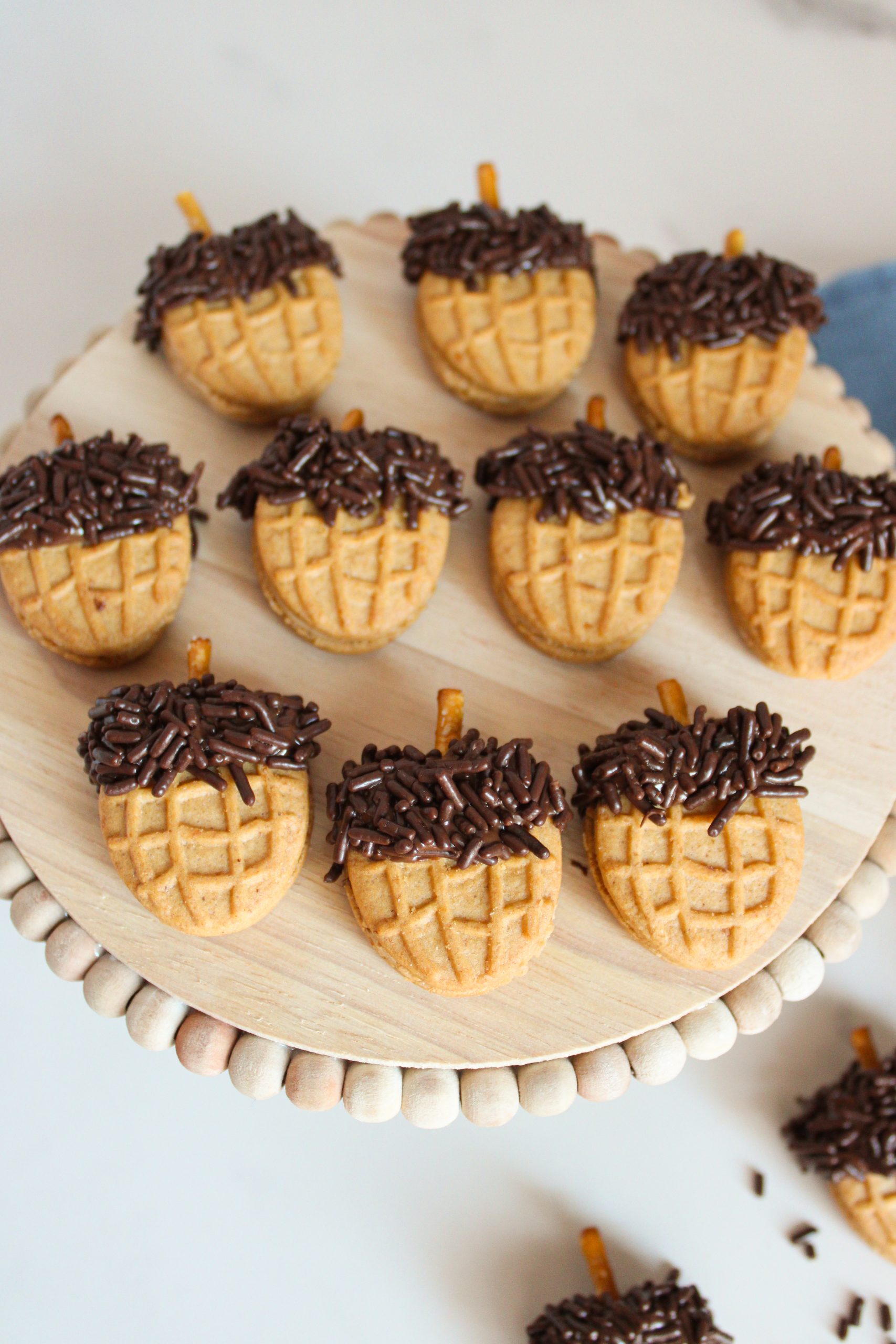 nutter butter acorn cookies together on a plate