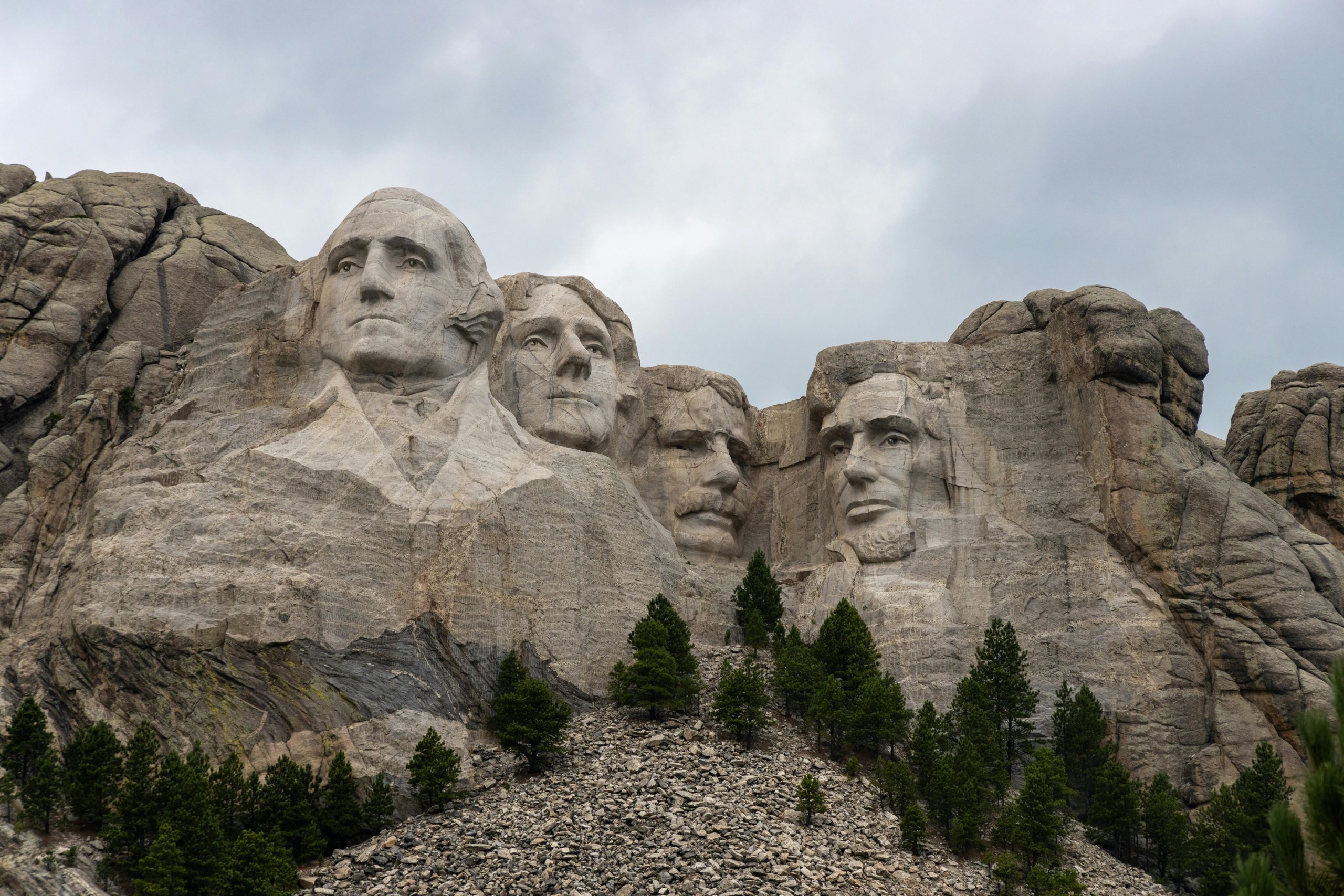 A striking view of Mount Rushmore featuring the carved faces of U.S. Presidents in the Black Hills of South Dakota.