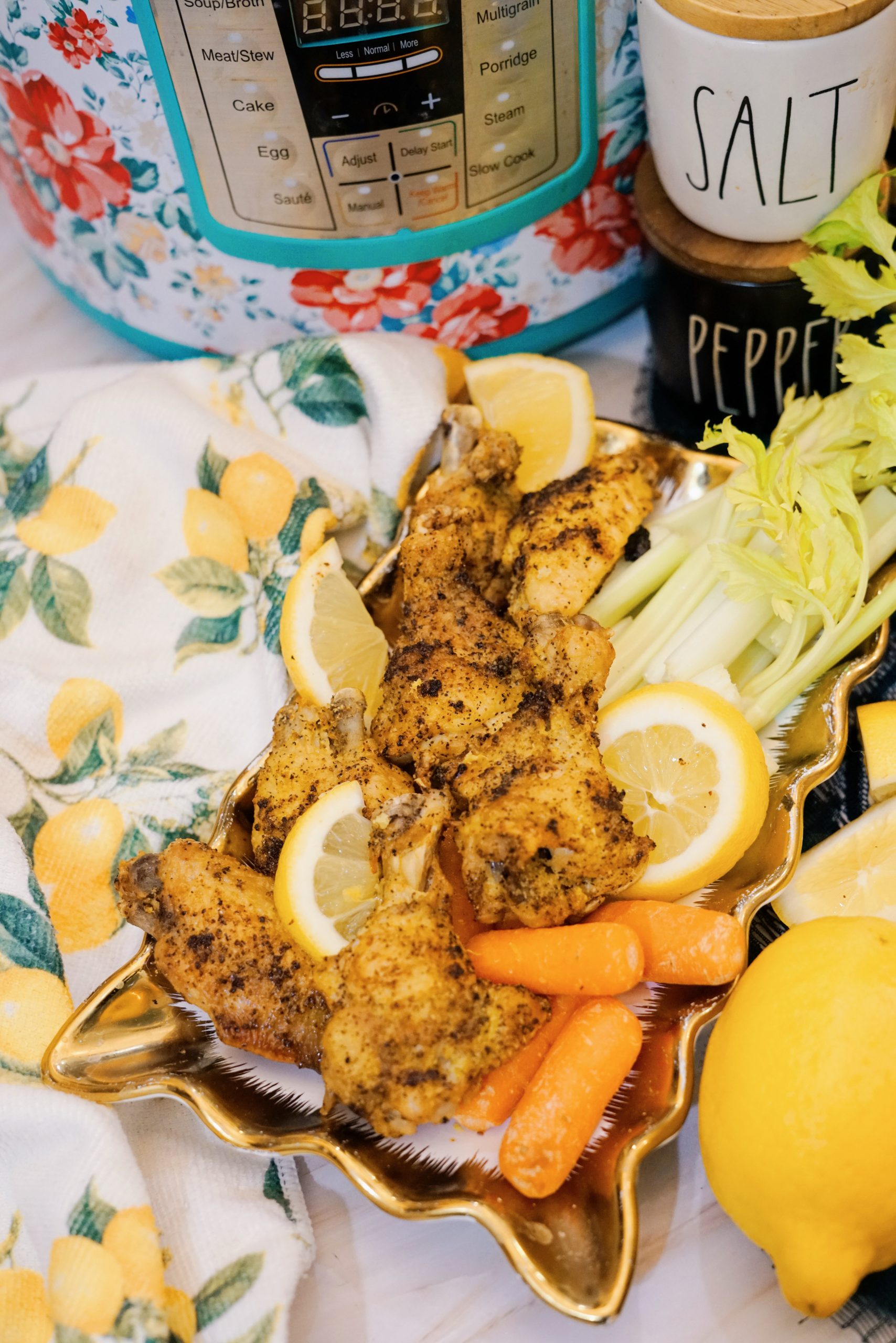 lemon pepper chicken wings made in the instant pot on a plate