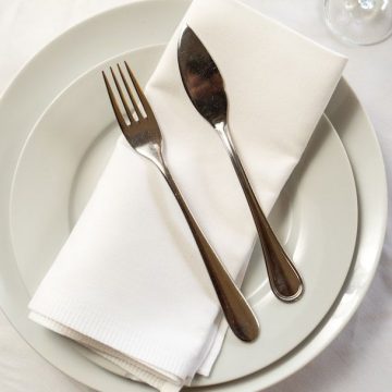 9 Things You Do With Your Napkin That Instantly Signal a Lack of Basic Table Manners